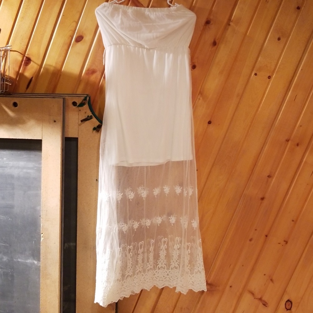 Strapless white dress with lace overlap